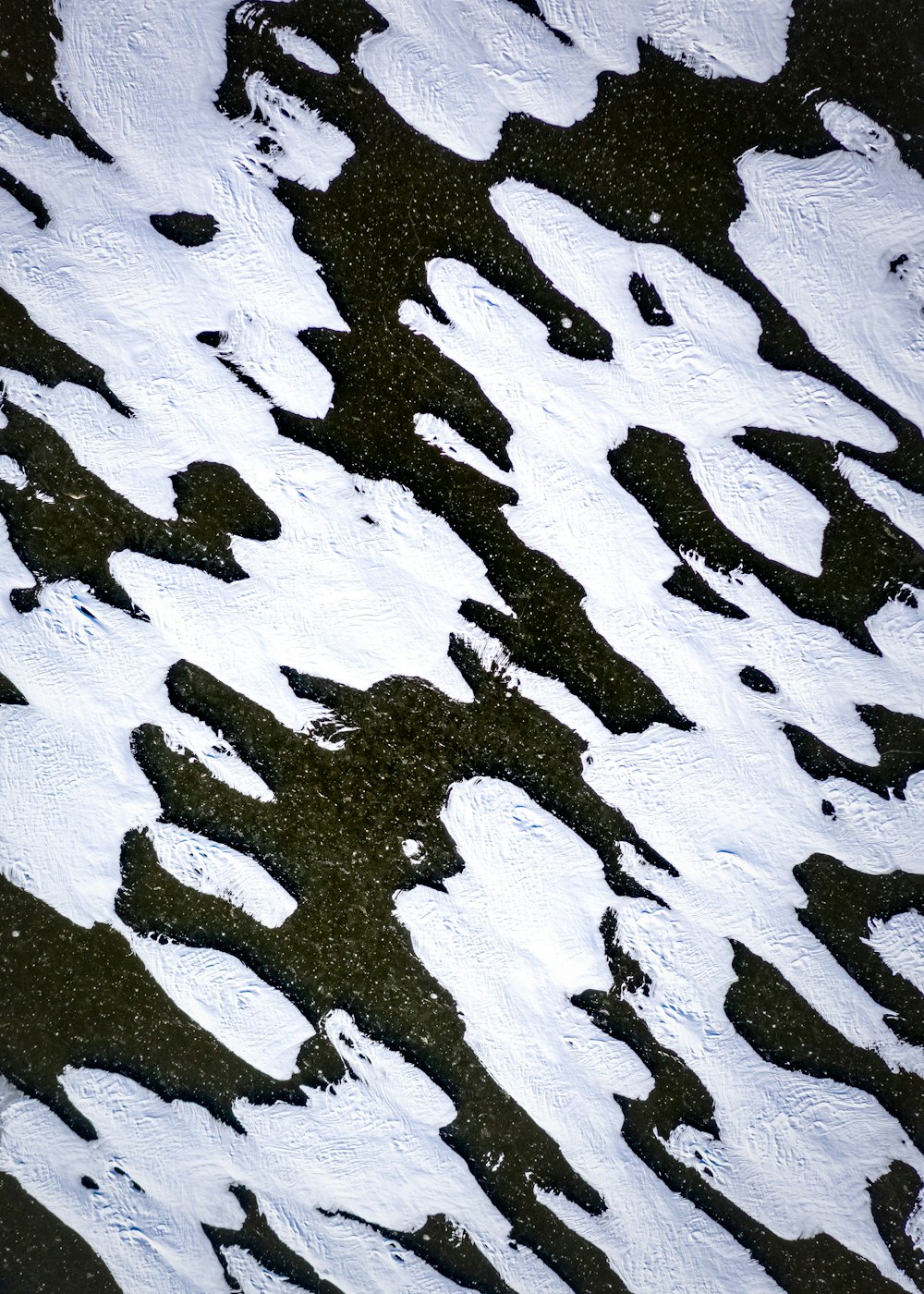 a snow covered mountain with lots of snow on it