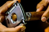 man cutting tobbacco