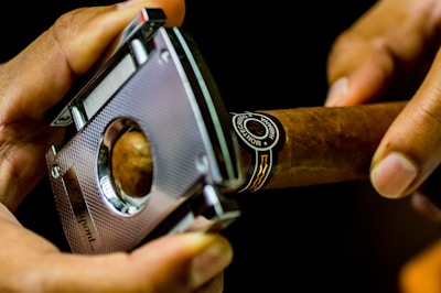 man cutting tobbacco