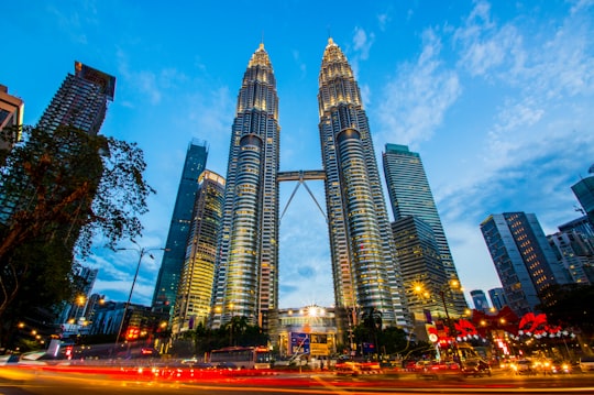 architectural photography of lighted city buildings in Petronas Twin Towers Malaysia