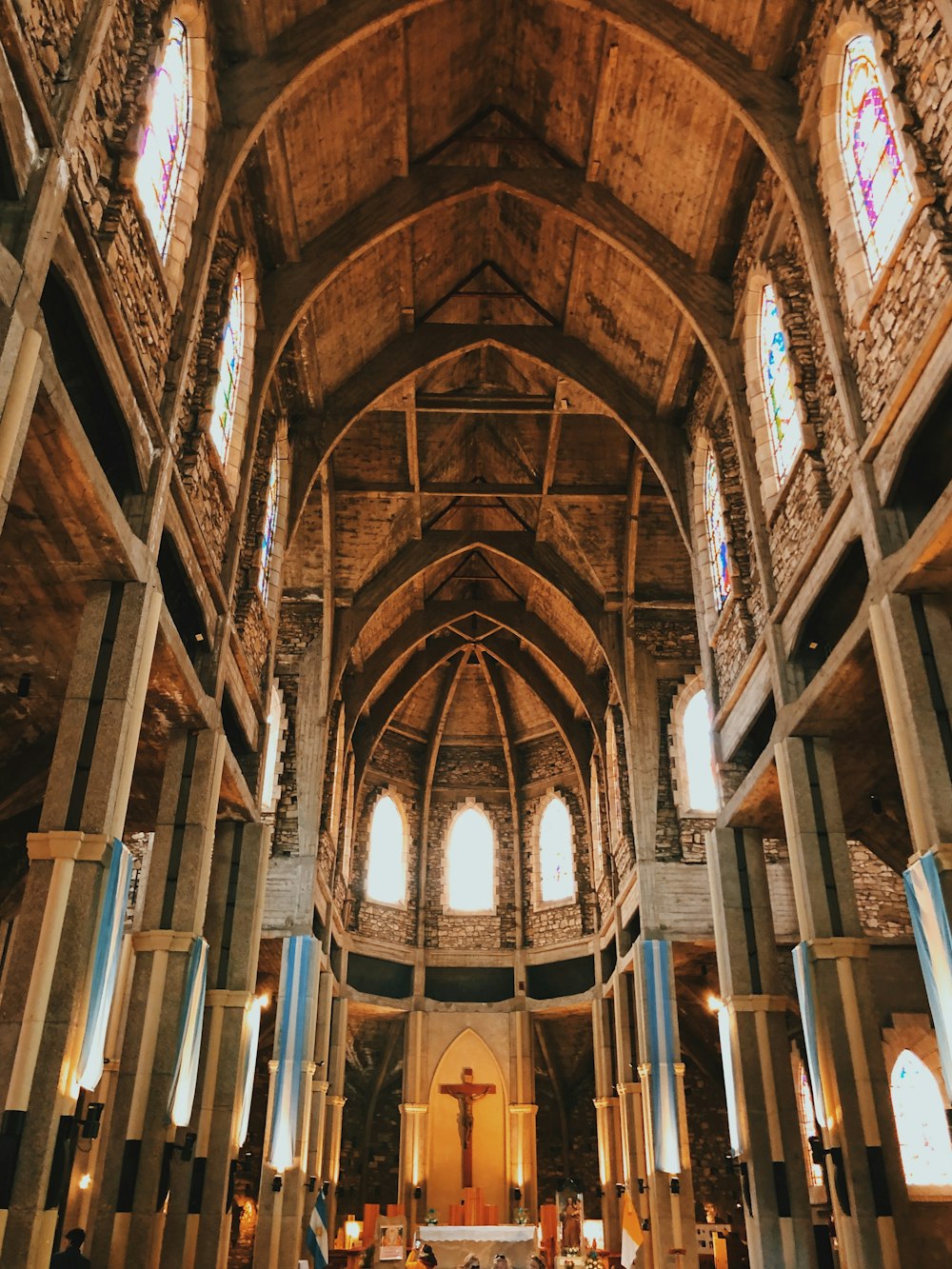 architectural photography of church aisle