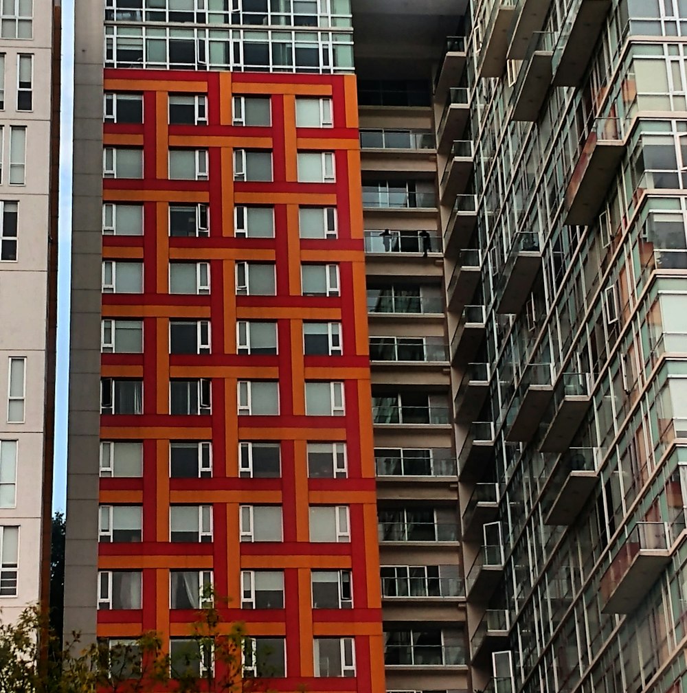 red and orange high-rise building