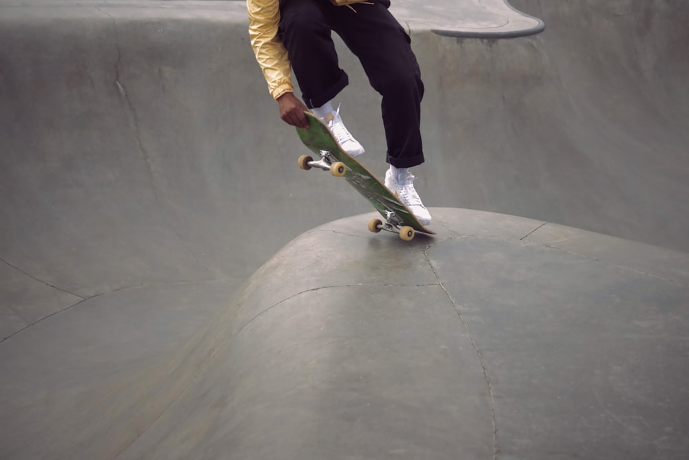 person holding skateboard