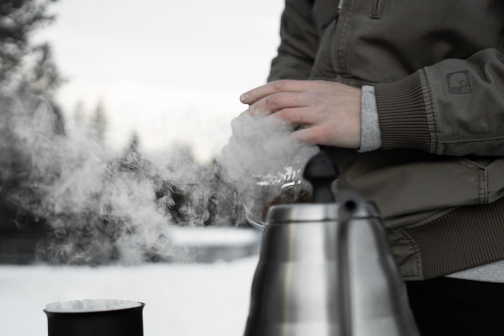 time-lapse photography of smoke coming out from a kettle