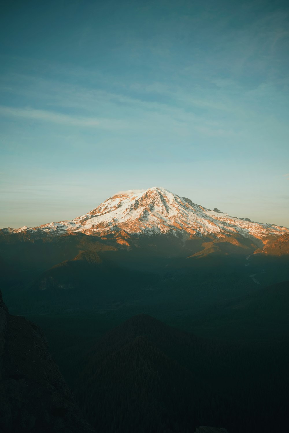 brown and white mountain covered with snow