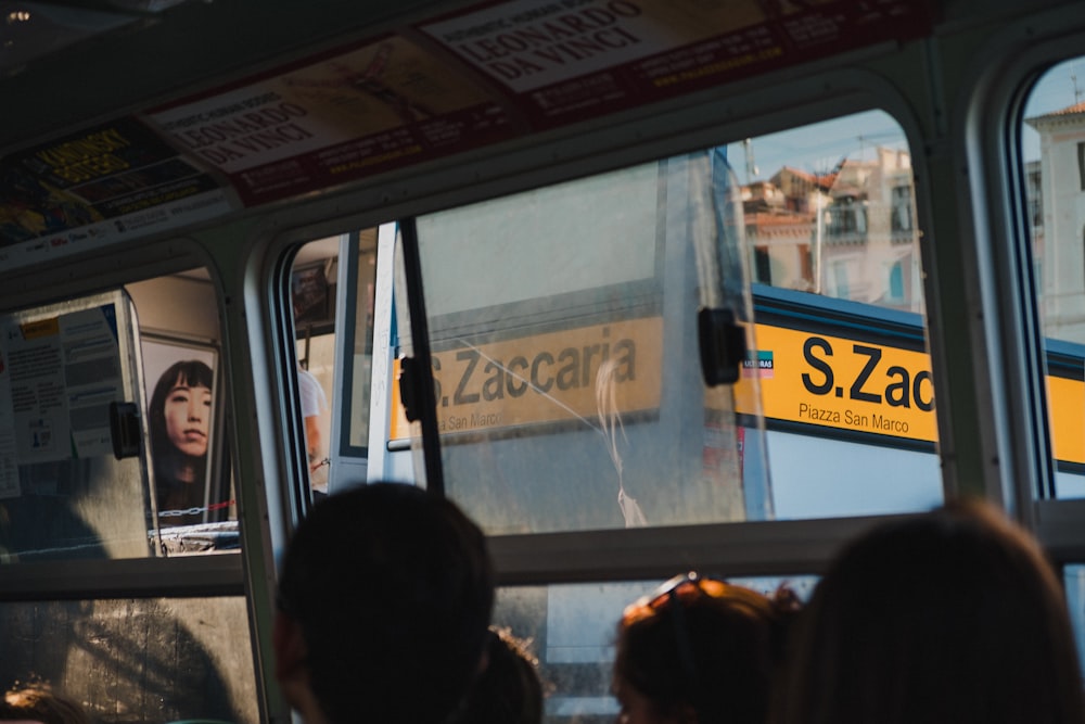 people sitting inside a bus