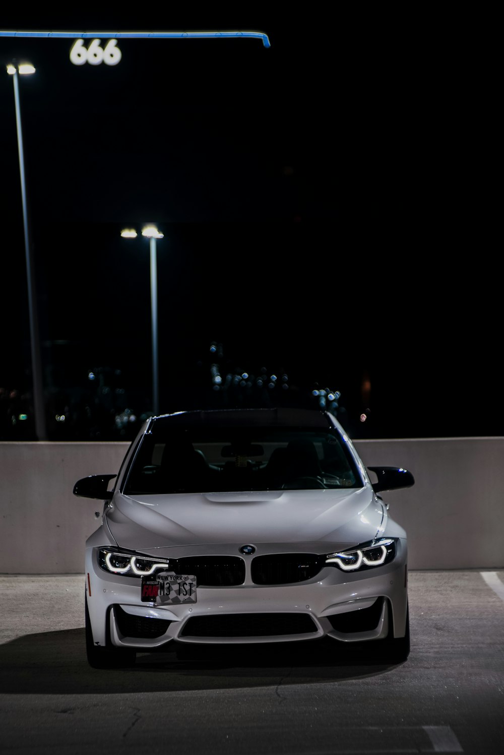 white BMW vehicle