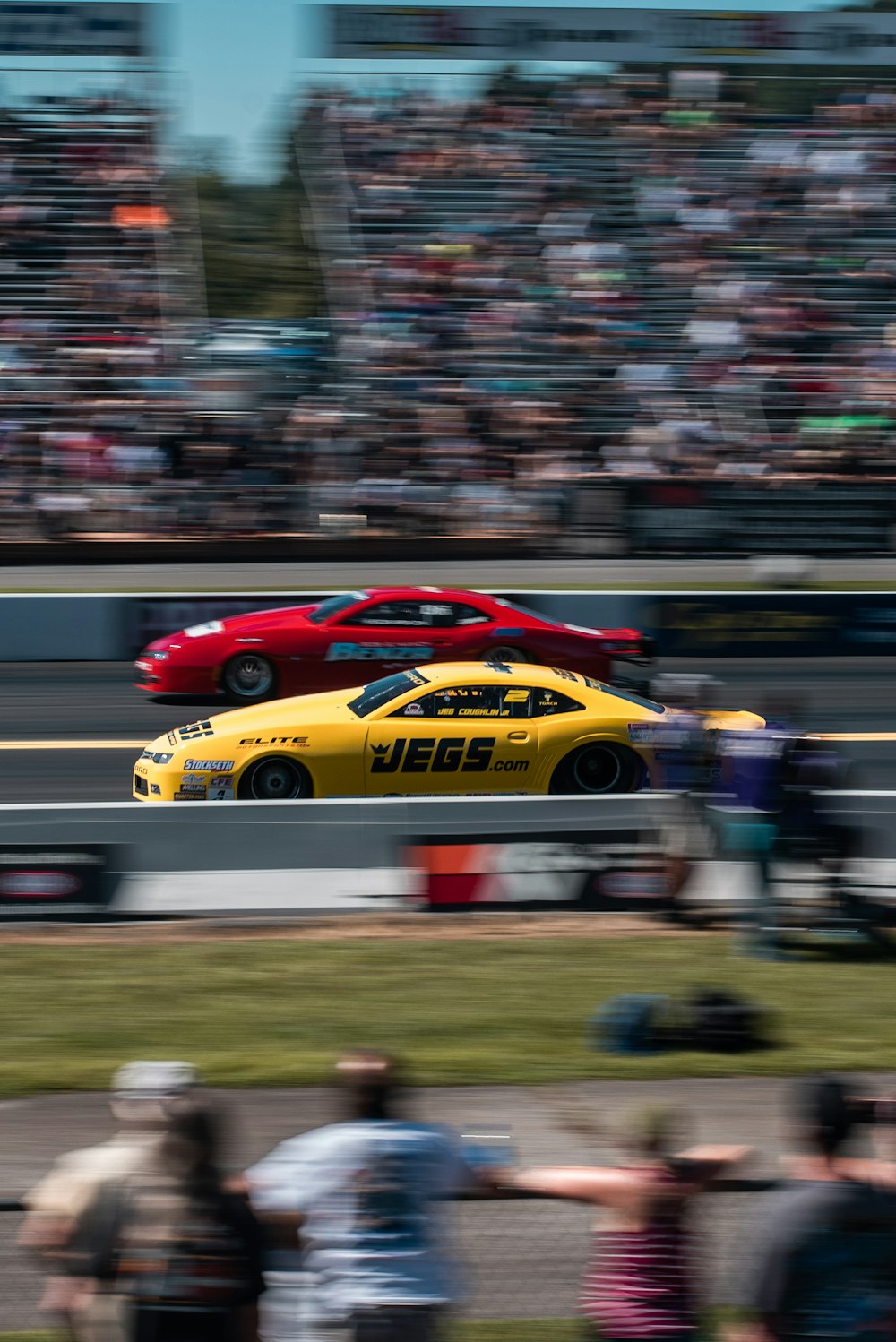 two cars on race tracks