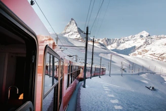 train moves between snowfield