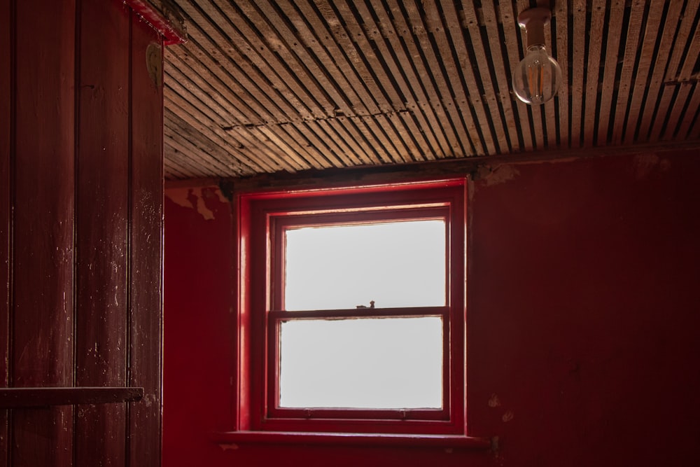 glass window with red frame