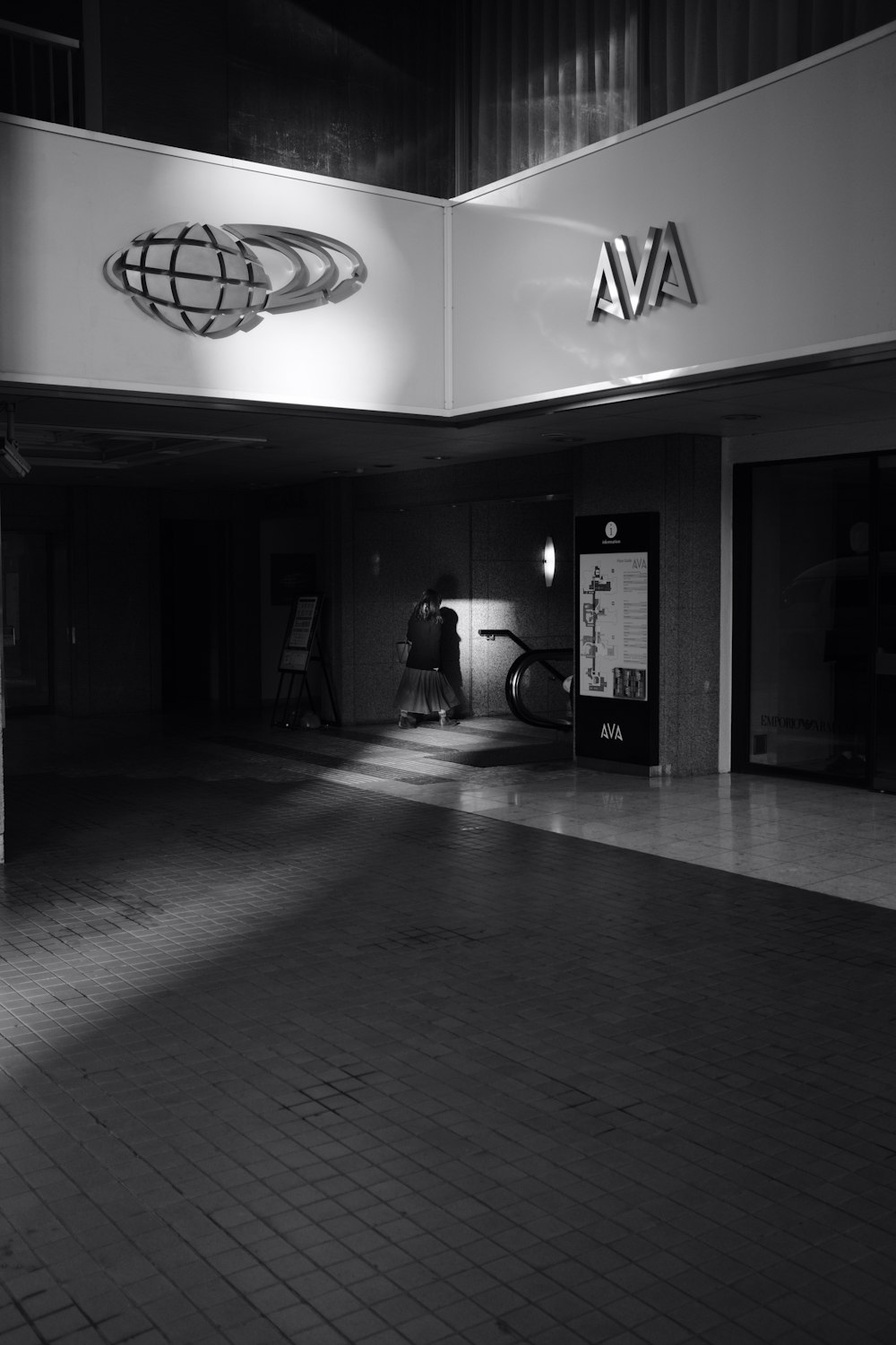 a black and white photo of an empty lobby