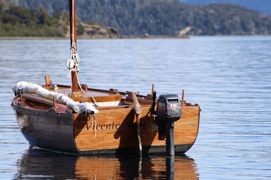 brown boat on body of water in San Carlos de Bariloche Argentina