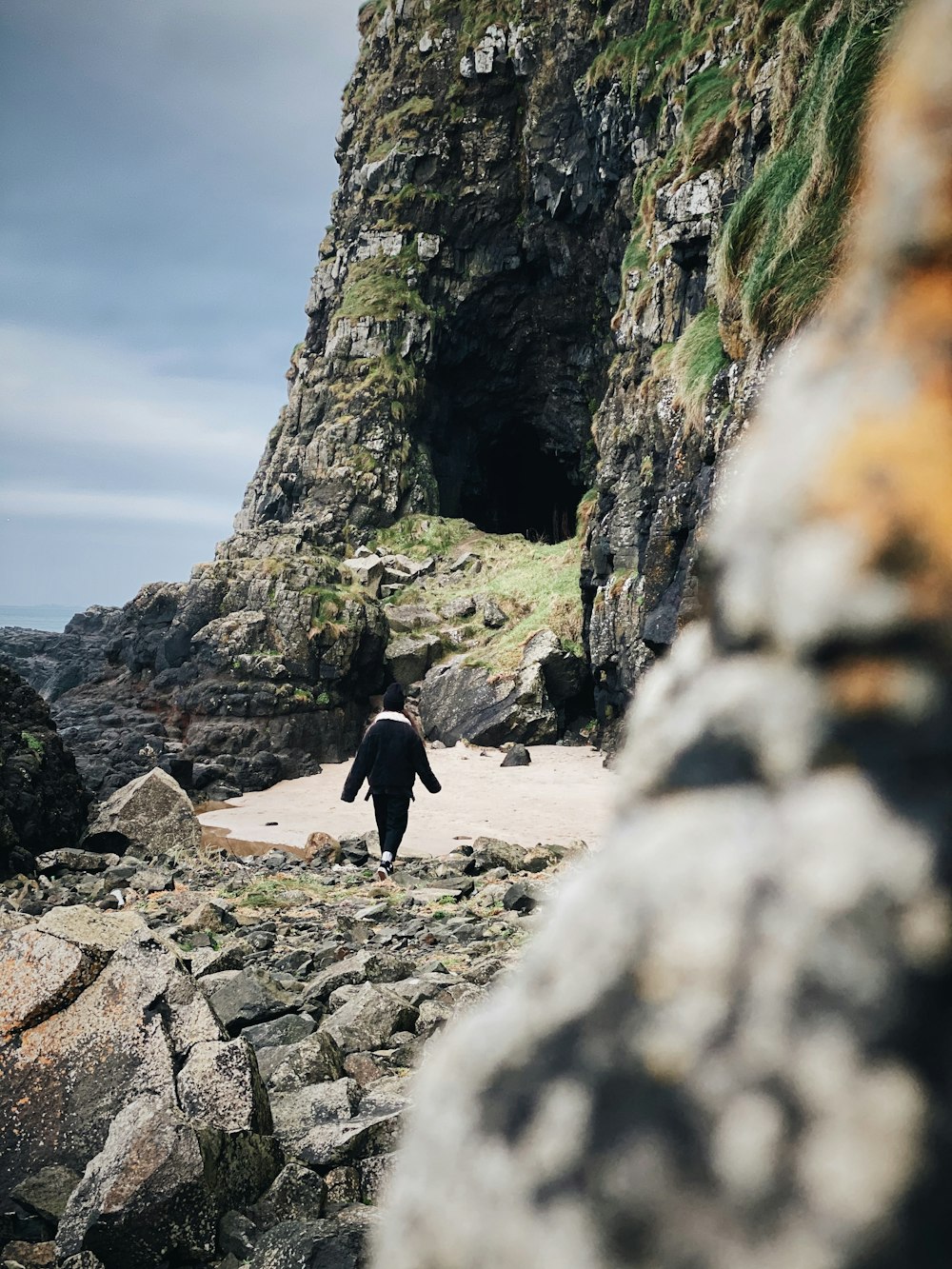 person standing on rocks