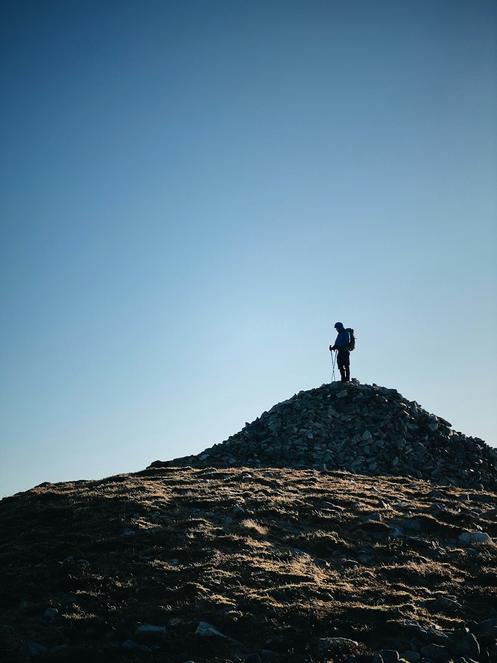 man standing on rocks