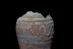 Close-up of a centuries-old ceramic pot recovered from the shipwreck.