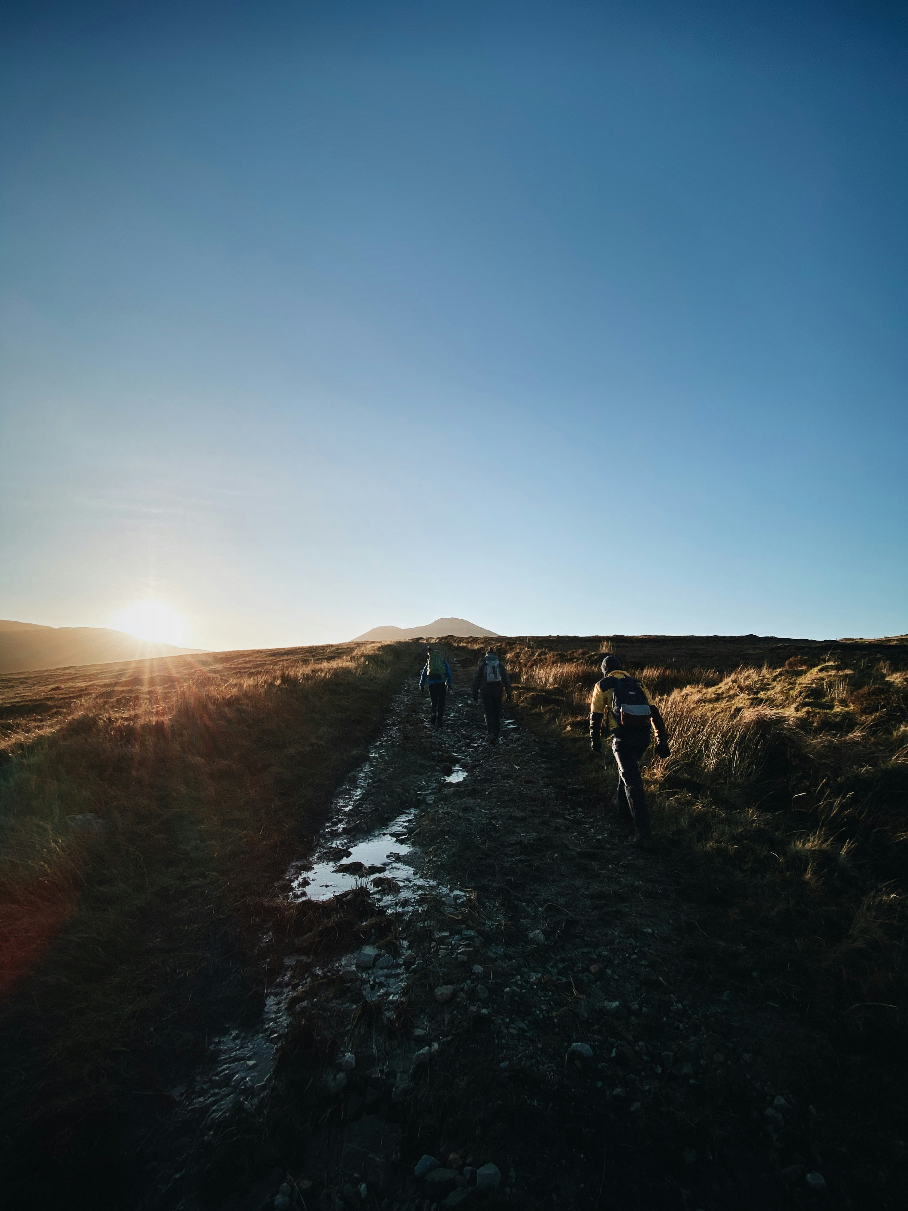 person walking on trail