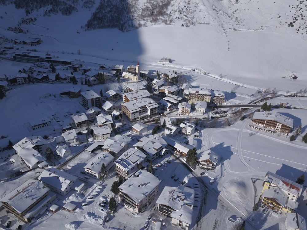 aerial photography of houses covered with snow