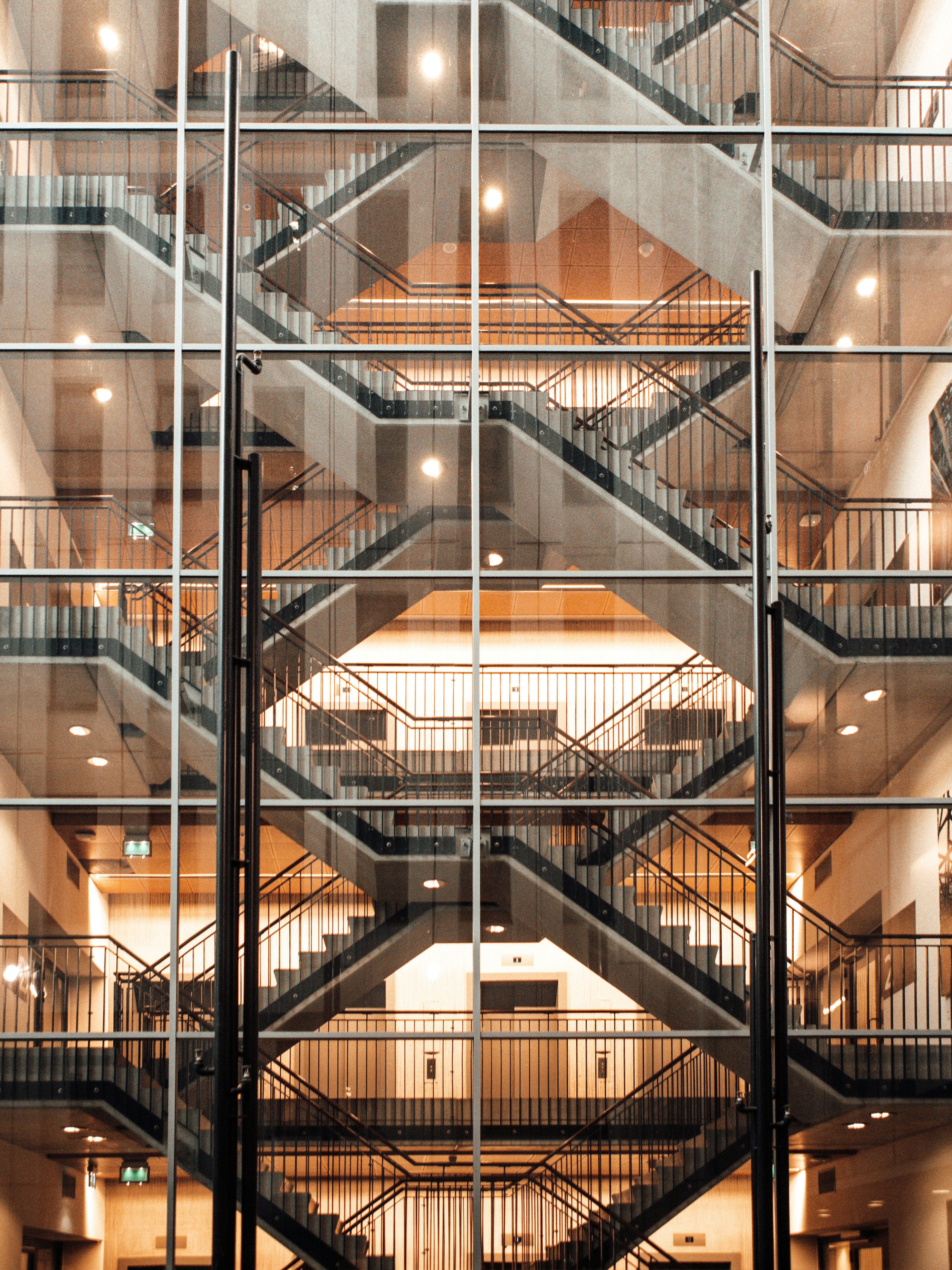 high-rise building with clear glass wall