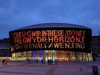 Volunteers helping build a community center in a Welsh town