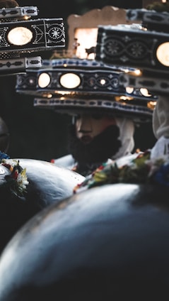 Festive berets with bright patterns and textures arranged in a circle