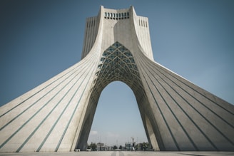 white concrete arch during daytime