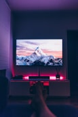 turned on flat screen TV inside room