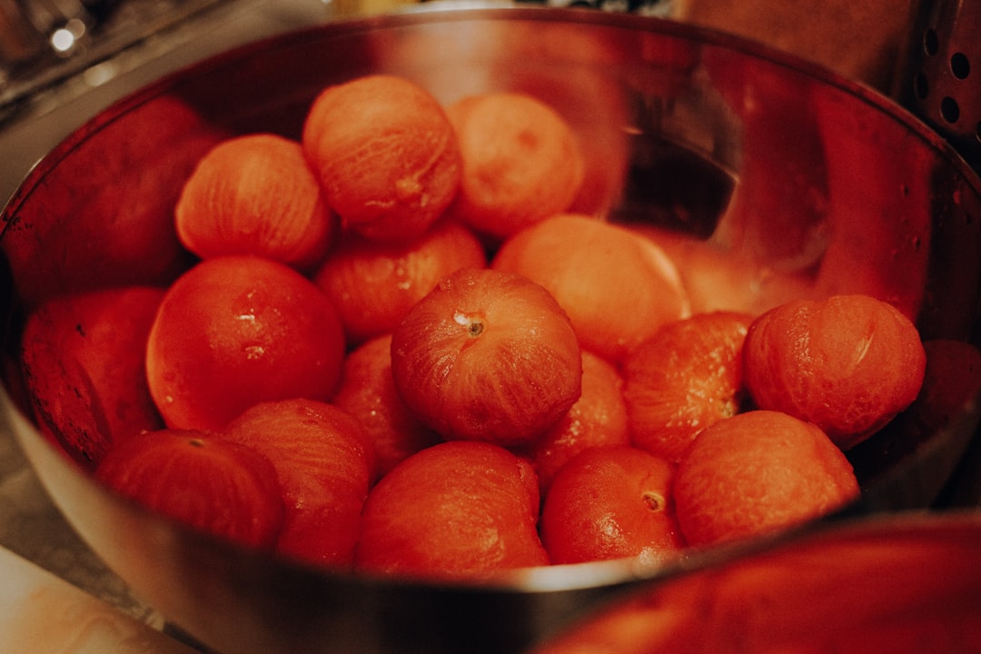 round red fruits in round bowl