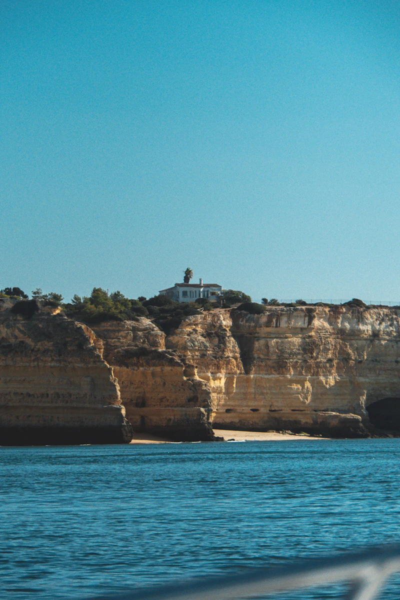 Cliff-top view over a golden sand beach on the western Algarve, near Portimão