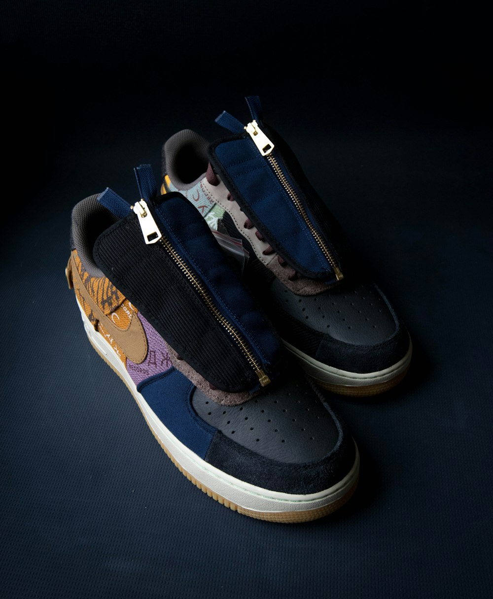 blue-brown-and-black Nike front-zip sneakers