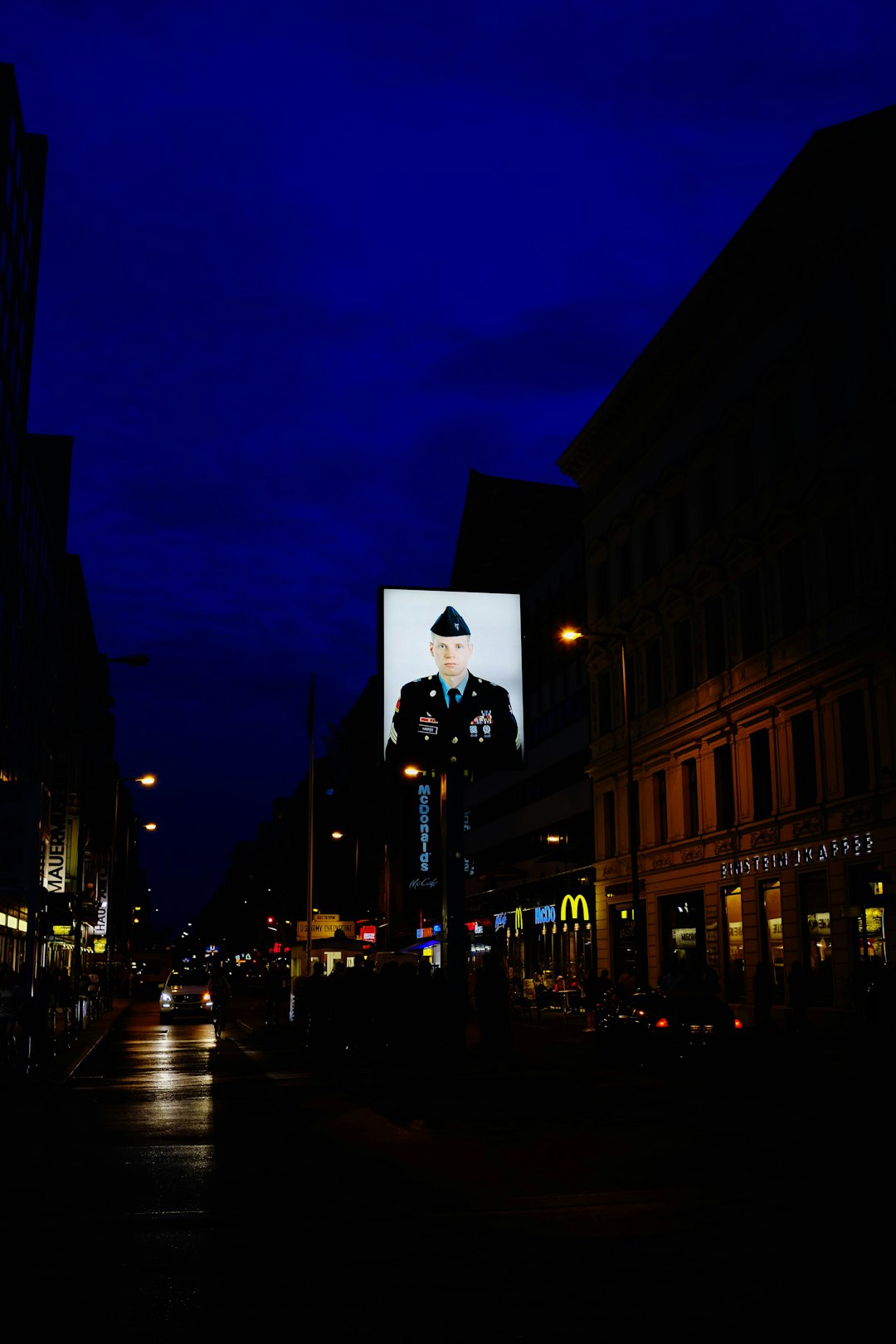 soldier showing on billboard at night