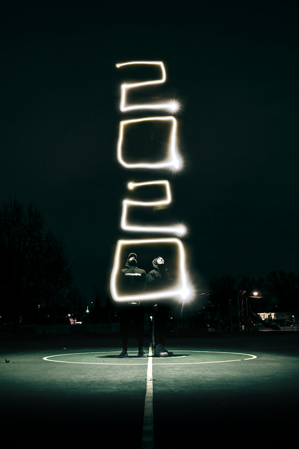 a person standing in front of a sign that says dead