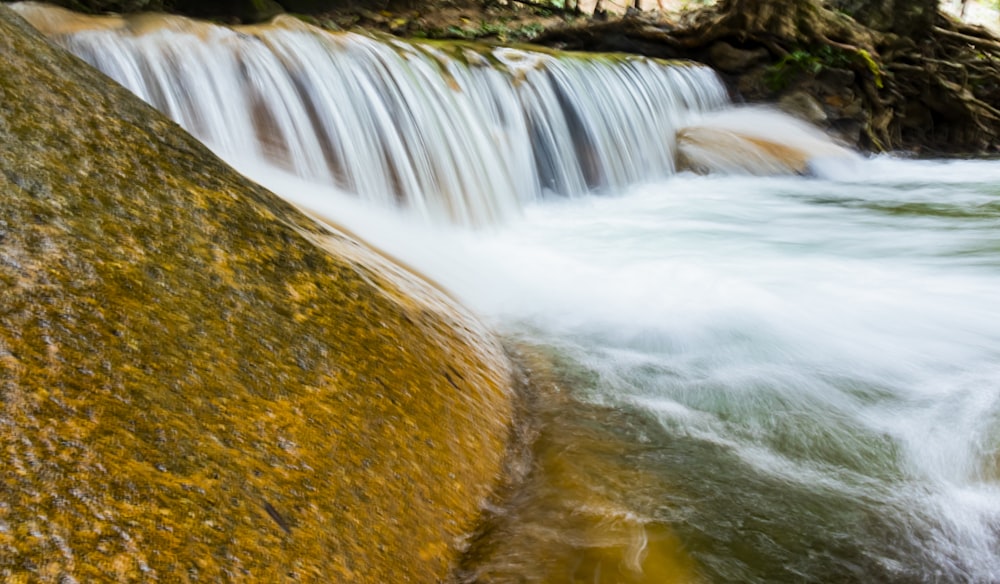 clear waterfalls during daytime