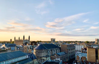 A scenic view of Toledo's historic skyline with its famous cathedral at sunset.