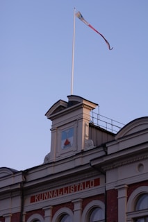A serene view of the Vantaa facility exterior with the Finnish flag colors reflected in the design.