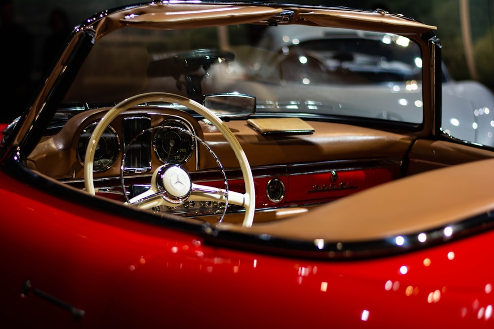 vintage red and brown convertible car