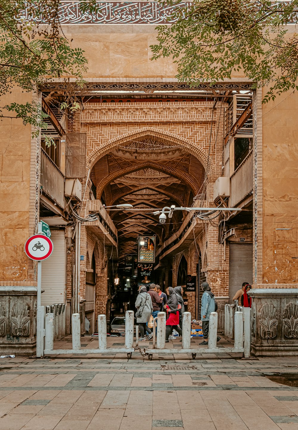 a group of people standing outside of a building