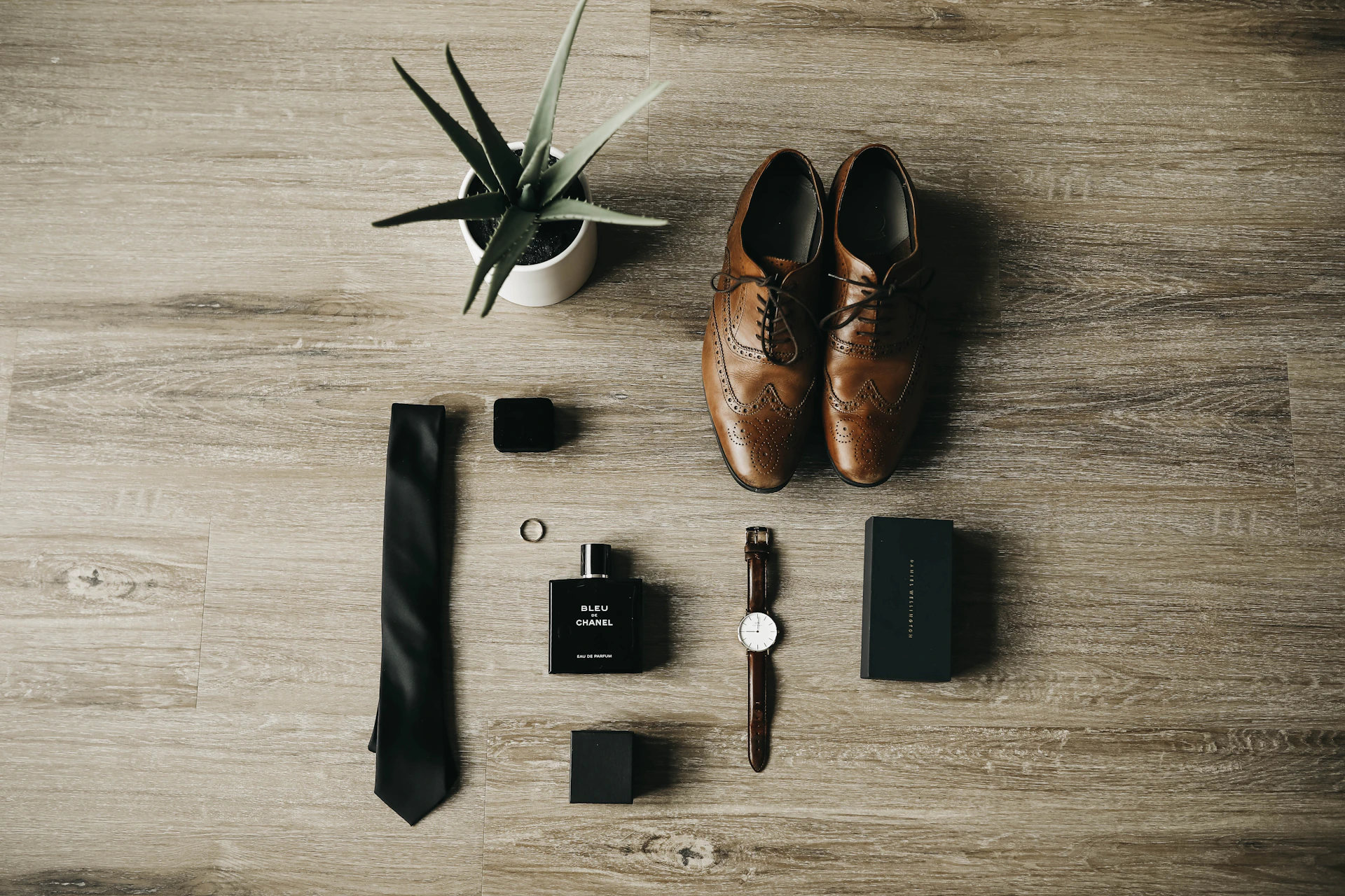 pair of brown leather dress shoes