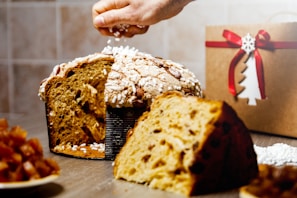 Close-up of a Bauducco panettone with golden crust and raisins inside