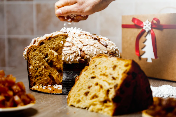 Slices of panetón showing the soft, fluffy texture filled with chocolate chips.