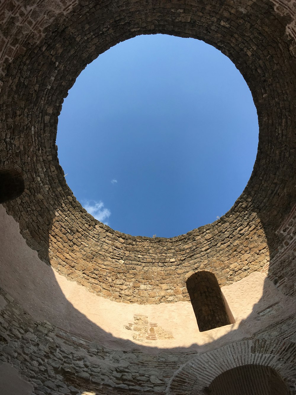 low-angle photography of brown historic ruins