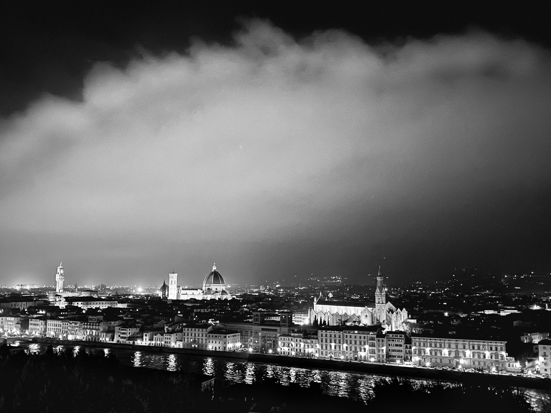 A striking black and yellow cinematic photo of a cityscape at night with glowing streetlights, embodying dark luxury and bold minimalism.