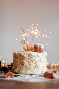 cake with lit sparkling stick