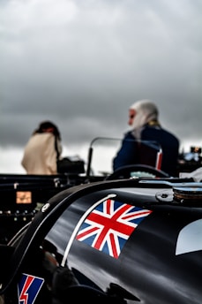 selective focus photography of UK flag on car