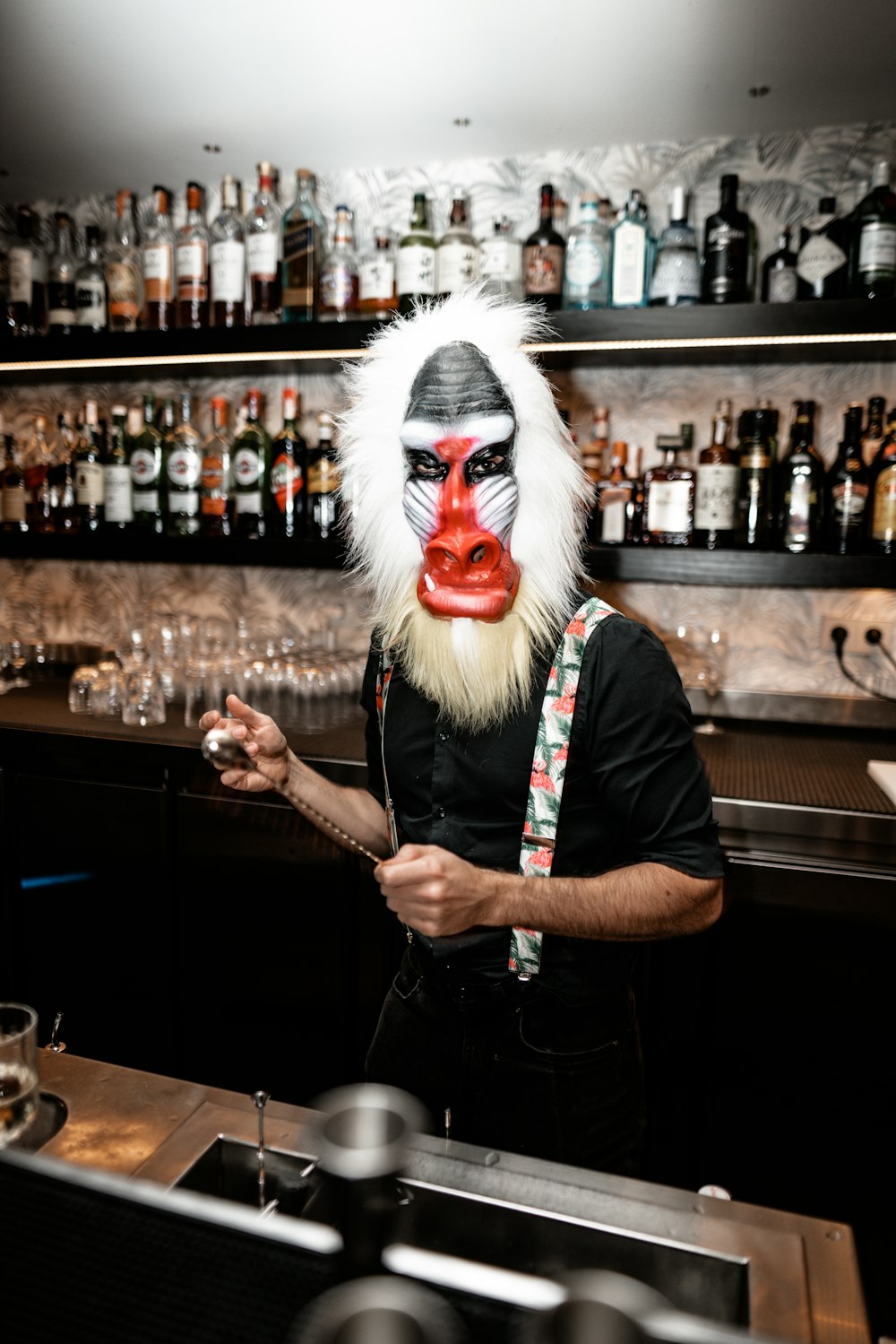 photography of man wearing monkey full-face mask