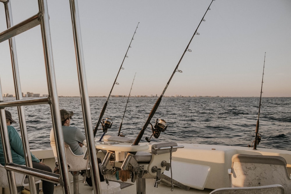 Four black fishing rods photo – Free Grey Image on Unsplash
