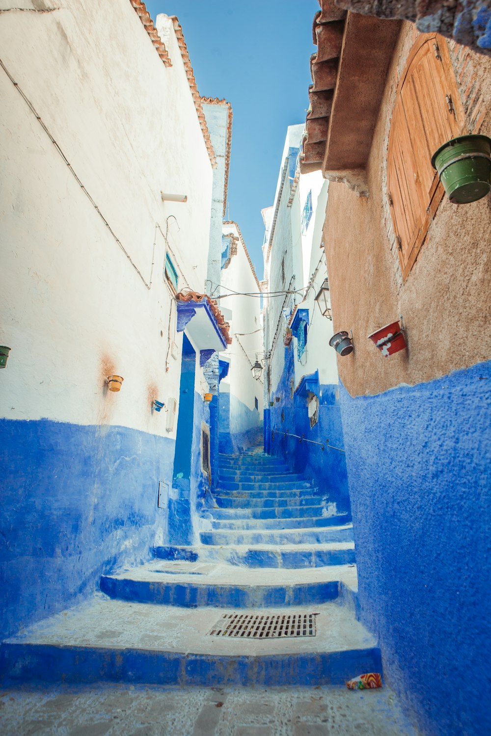 blue and white concrete hallway stairs