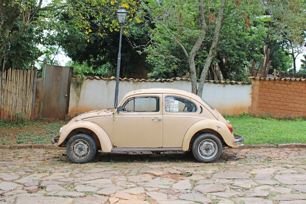 beige Volkswagen Beetle