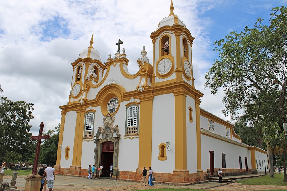 people beside and near church during day