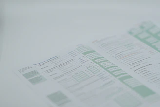 a close up of a menu on a table