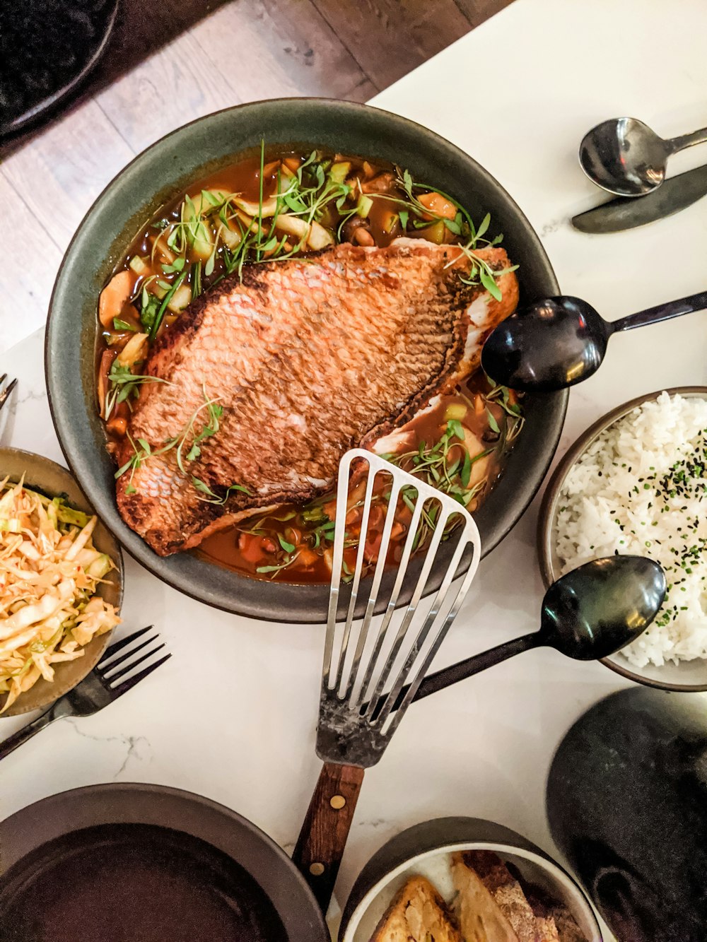 cooked stew fish on cooking pot